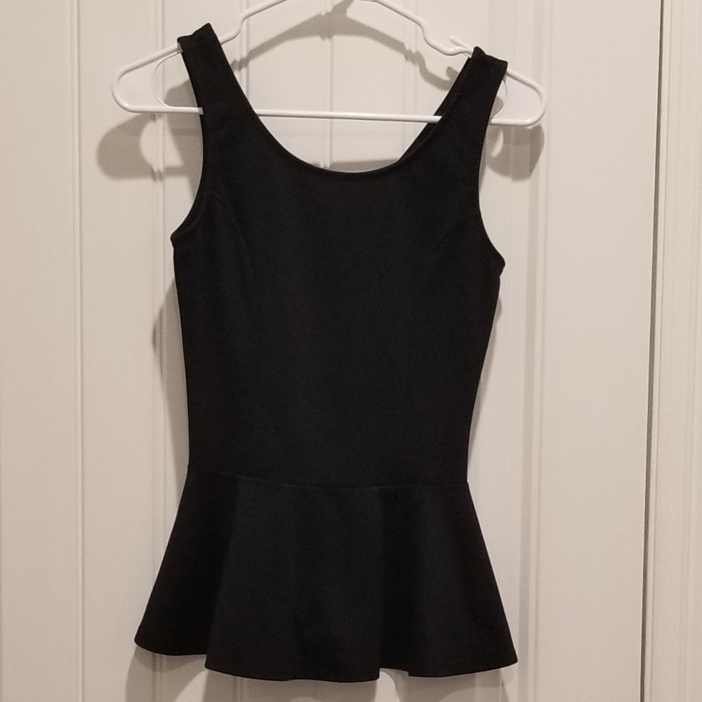 Ing black sleeveless peplum top size Small